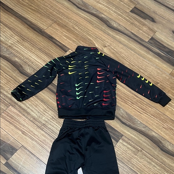 Nike Black Tracksuit with Red, Green and Yellow Accents. - Picture 6 of 9